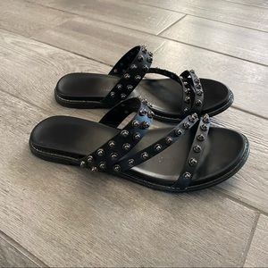 Black leather sandals with spikes